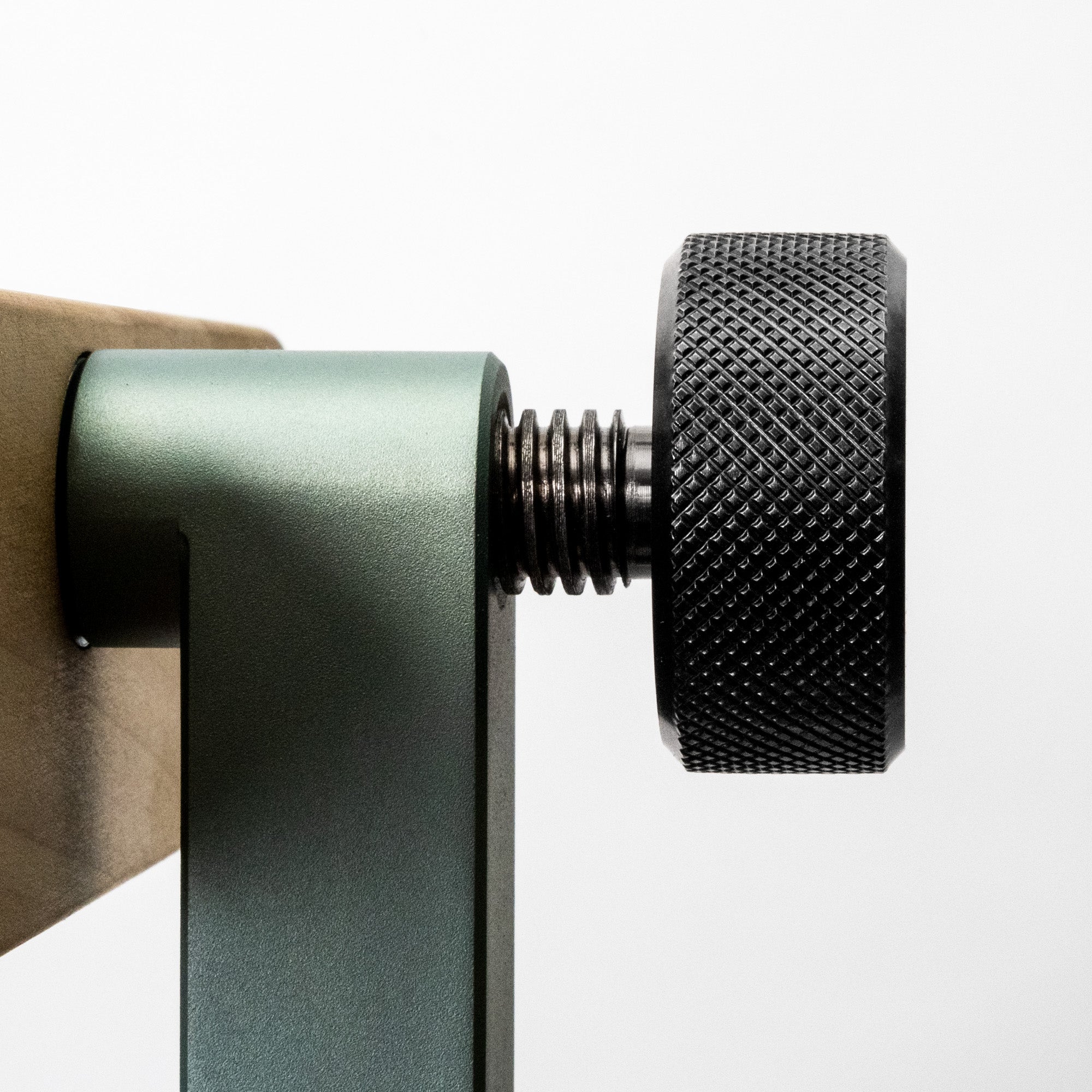 Close up view of DMP thumb knob