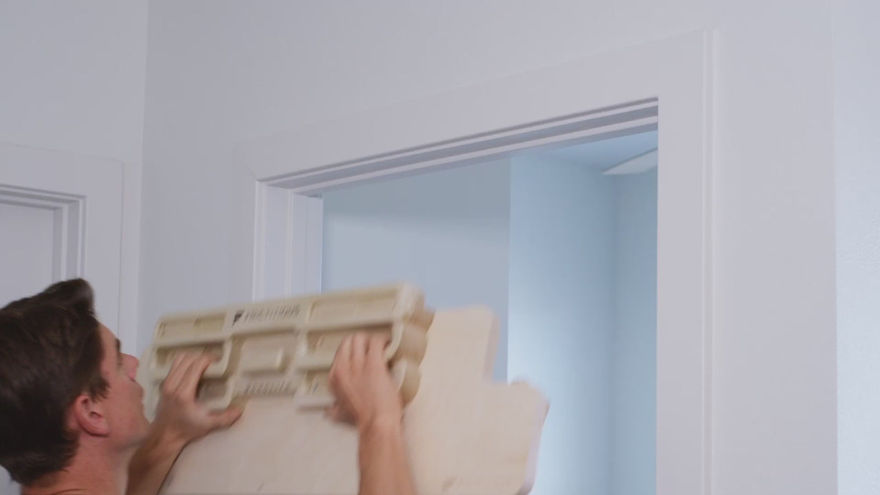 Garret putting the Doorway Mount up in a doorway